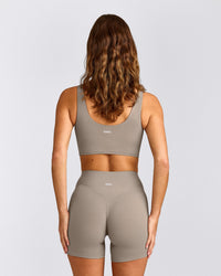 SoftMotion™ Longline Sports Bra with White Logo | Warm Sand