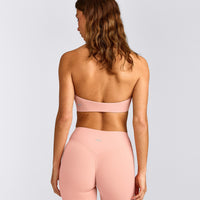 SoftMotion™ Minimal Halter Neck Bralette with Grey Logo | Peach Orange