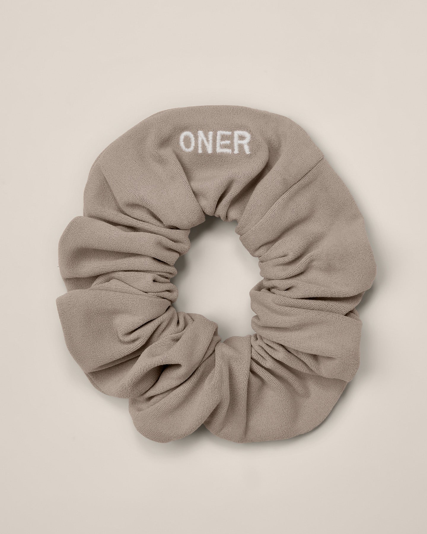 SoftMotion™ Scrunchie with White Logo | Warm Sand