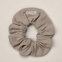 SoftMotion™ Scrunchie with White Logo | Warm Sand