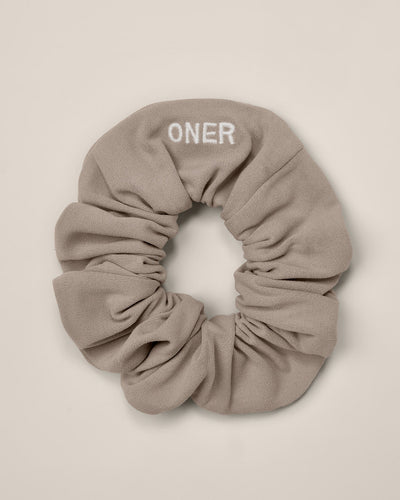 SoftMotion™ Scrunchie with White Logo | Warm Sand