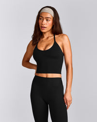 SoftMotion™ Strappy Halter Neck Mid Vest with Built in Bra Shelf with Grey Logo | Black