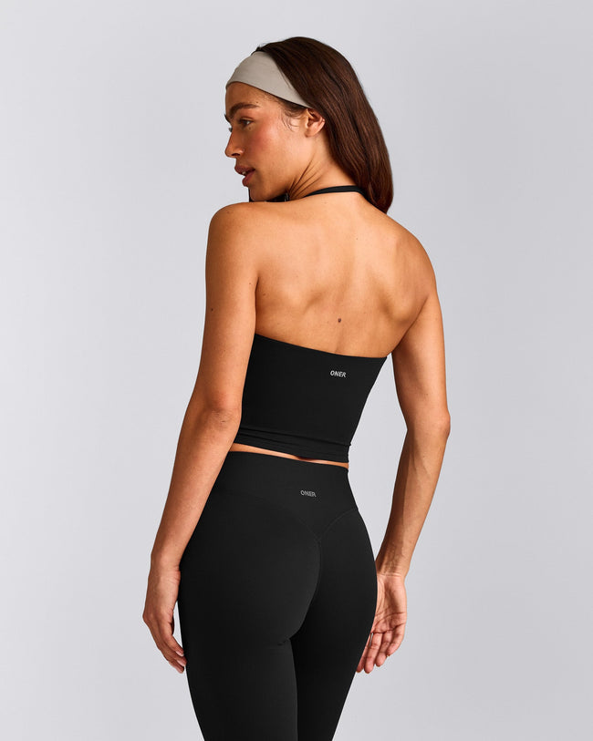 SoftMotion™ Strappy Halter Neck Mid Vest with Built in Bra Shelf with Grey Logo | Black