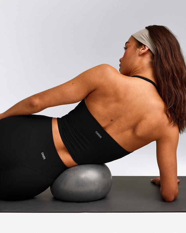 SoftMotion™ Strappy Halter Neck Mid Vest with Built in Bra Shelf with Grey Logo | Black
