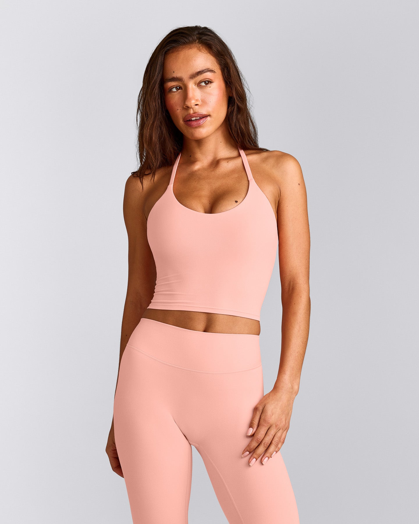 SoftMotion™ Strappy Halter Neck Mid Vest with Built in Bra Shelf with Grey Logo | Peach Orange
