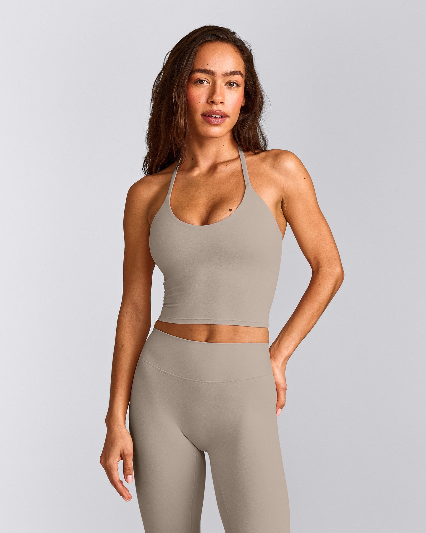 SoftMotion™ Strappy Halter Neck Mid Vest with Built in Bra Shelf with White Logo | Warm Sand