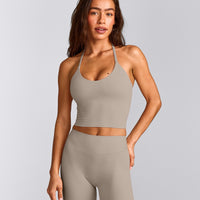 SoftMotion™ Strappy Halter Neck Mid Vest with Built in Bra Shelf with White Logo | Warm Sand