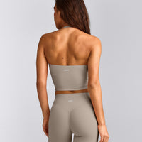 SoftMotion™ Strappy Halter Neck Mid Vest with Built in Bra Shelf with White Logo | Warm Sand