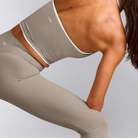 SoftMotion™ Strappy Halter Neck Mid Vest with Built in Bra Shelf with White Logo | Warm Sand