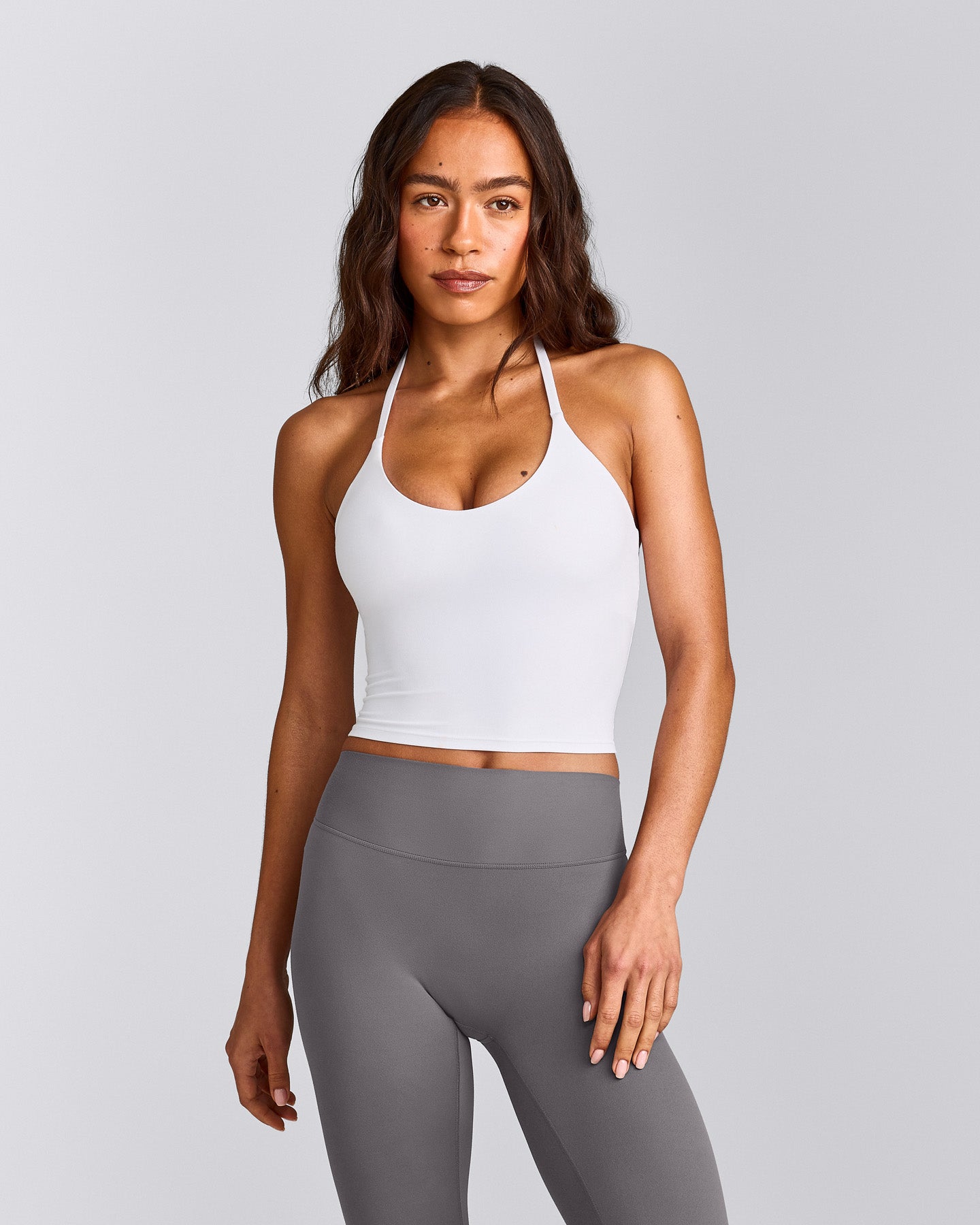 SoftMotion™ Strappy Halter Neck Mid Vest with Built in Bra Shelf with Grey Logo | White