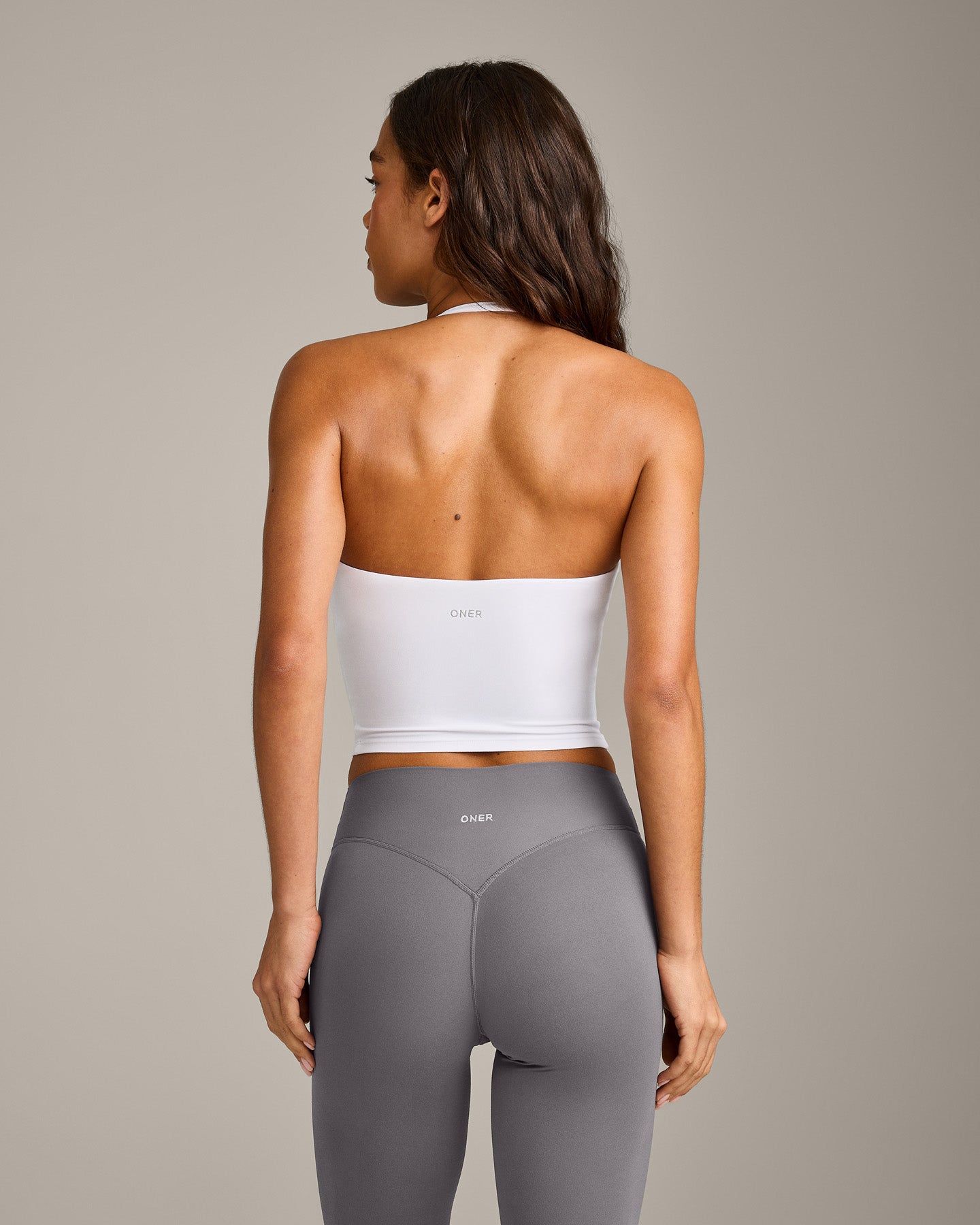 SoftMotion™ Strappy Halter Neck Mid Vest with Built in Bra Shelf with Grey Logo | White