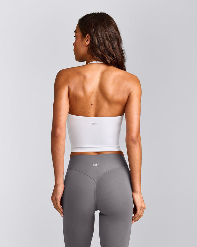 SoftMotion™ Strappy Halter Neck Mid Vest with Built in Bra Shelf with Grey Logo | White