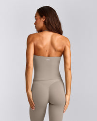 SoftMotion™ Strappy Halter Neck Vest with Built in Bra Shelf with White Logo | Warm Sand