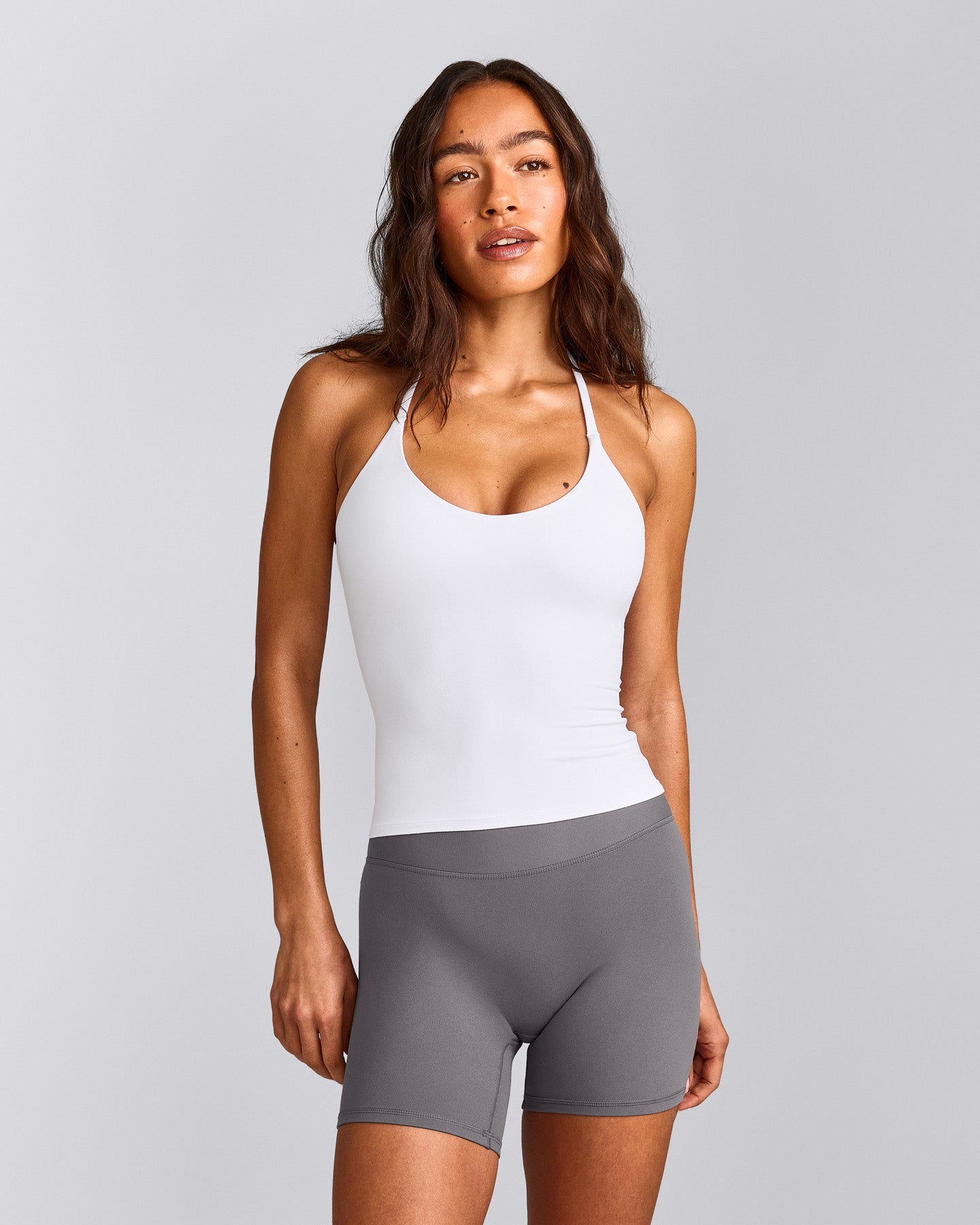 SoftMotion™ Strappy Halter Neck Vest with Built in Bra Shelf with Grey Logo | White
