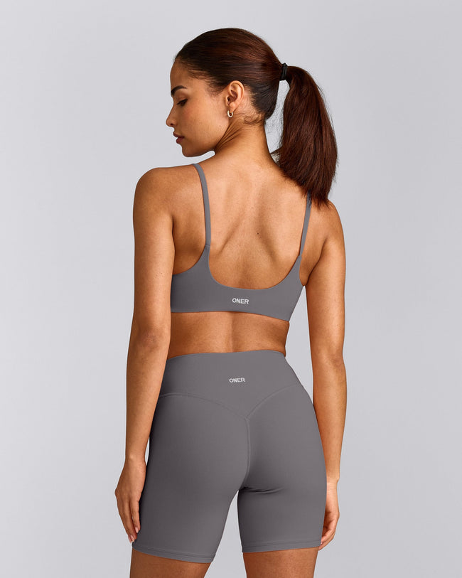 SoftMotion™ Strappy Sports Bra with Grey Logo | Ash Grey