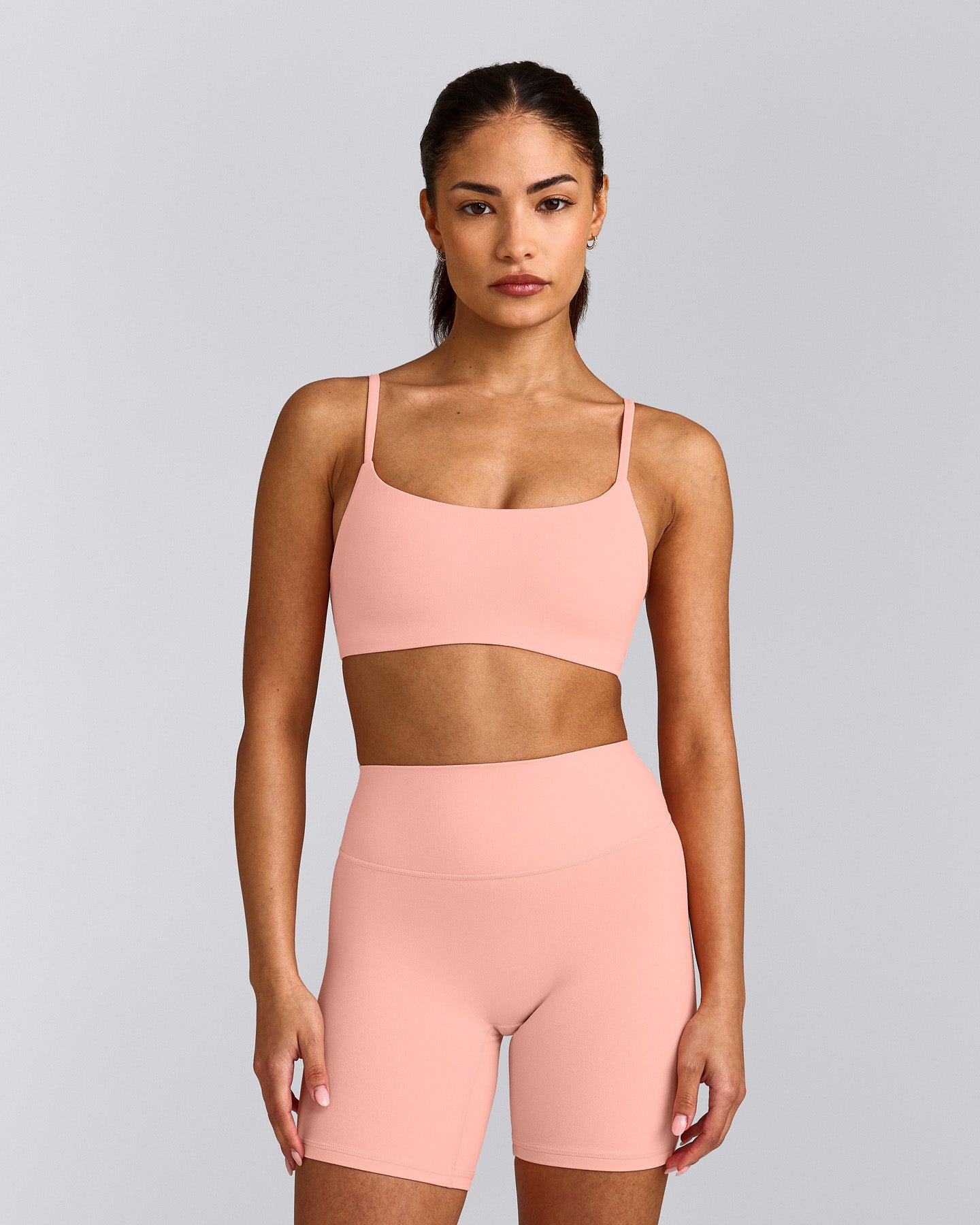 SoftMotion™ Strappy Sports Bra with Grey Logo | Peach Orange