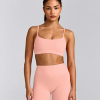 SoftMotion™ Strappy Sports Bra with Grey Logo | Peach Orange