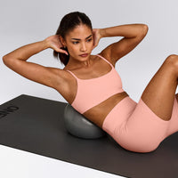SoftMotion™ Strappy Sports Bra with Grey Logo | Peach Orange