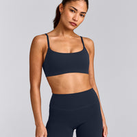 SoftMotion™ Strappy Sports Bra with Grey Logo | True Blue