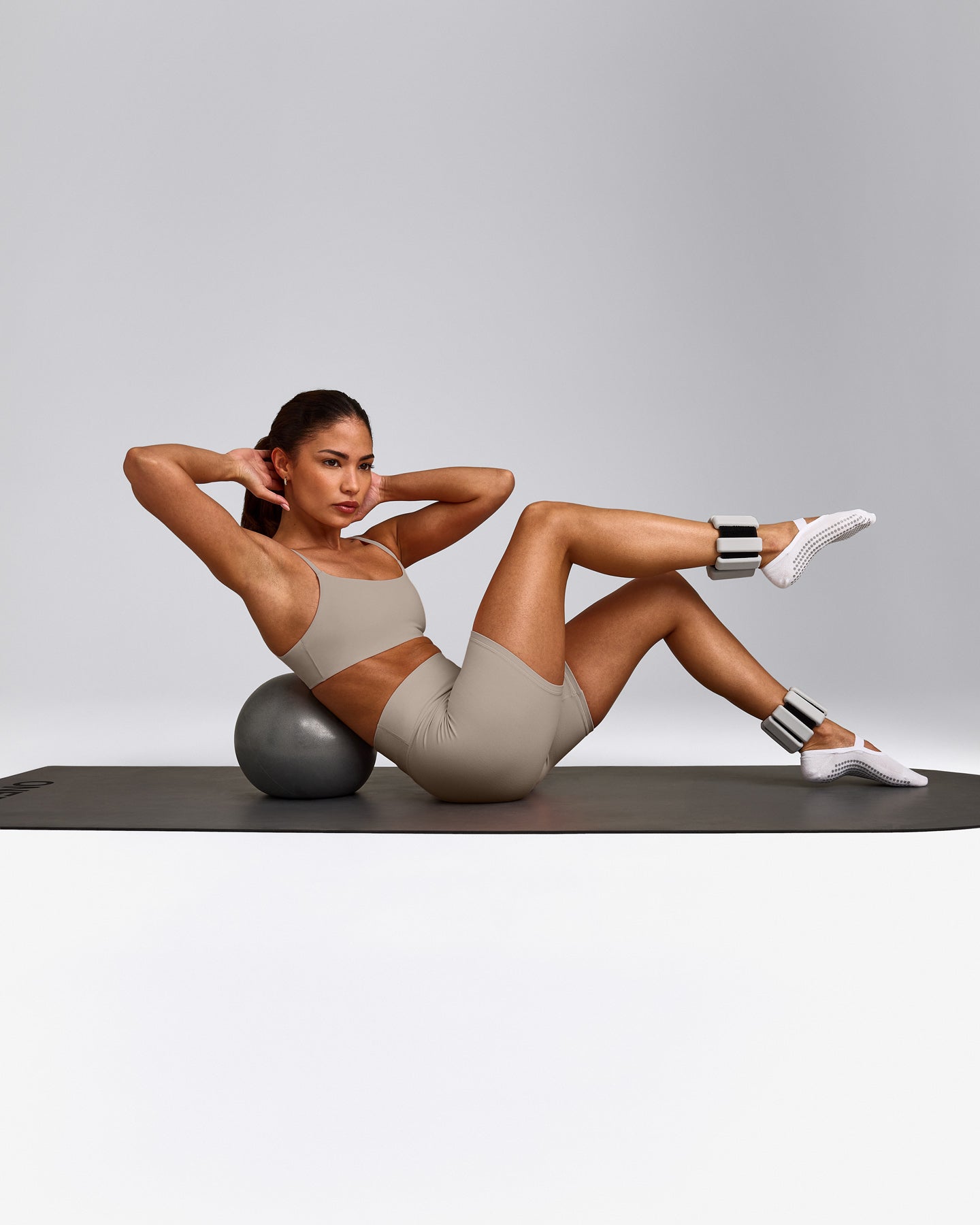 SoftMotion™ Strappy Sports Bra with White Logo | Warm Sand