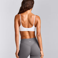 SoftMotion™ Strappy Sports Bra with Grey Logo | White