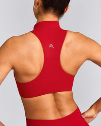 EasyLift™ Zip High Neck Sports Bra with Grey Logo | Fiery Red