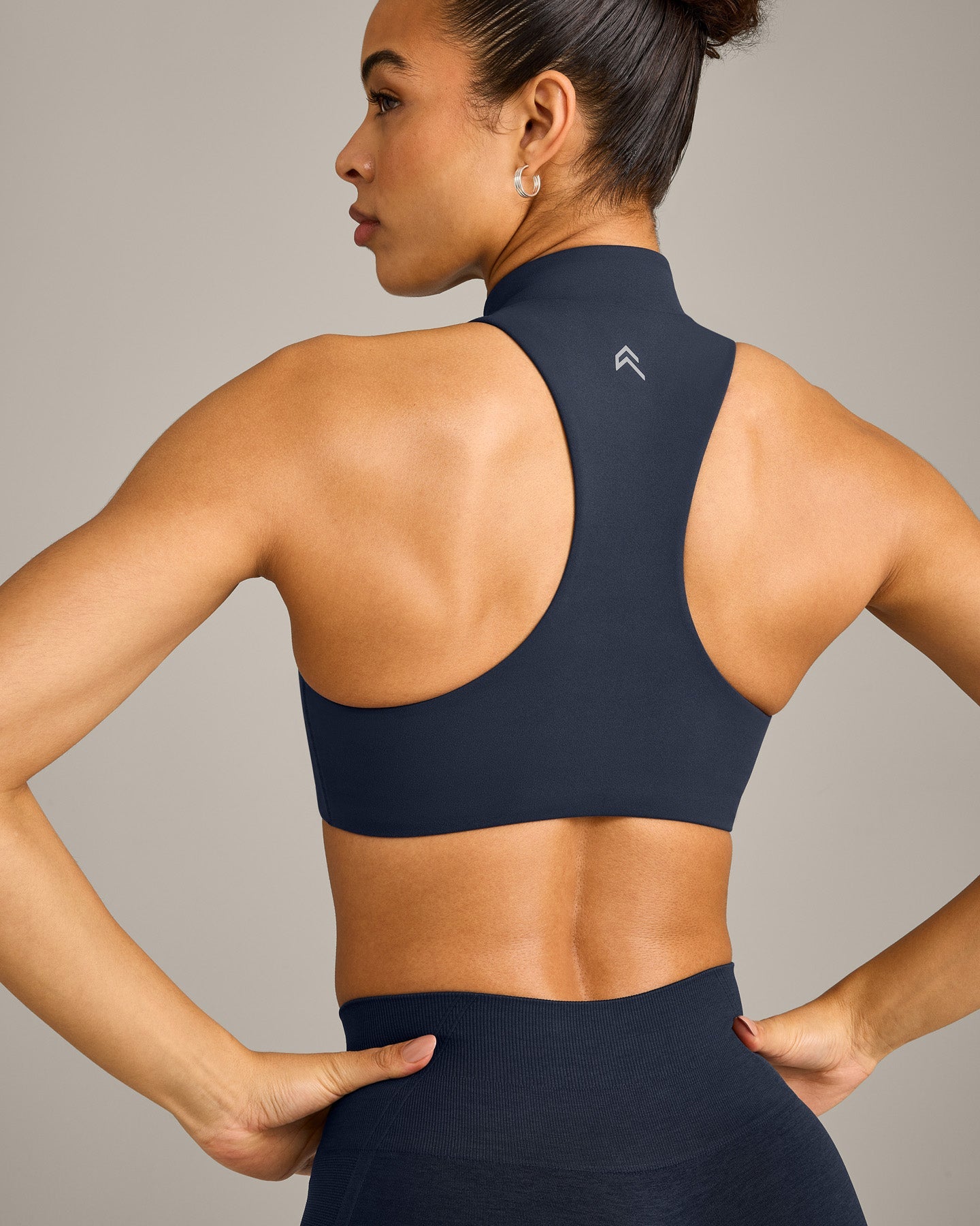EasyLift™ Zip High Neck Sports Bra with Grey Logo | True Blue