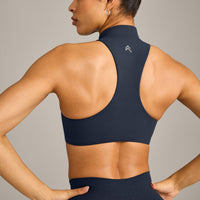 EasyLift™ Zip High Neck Sports Bra with Grey Logo | True Blue