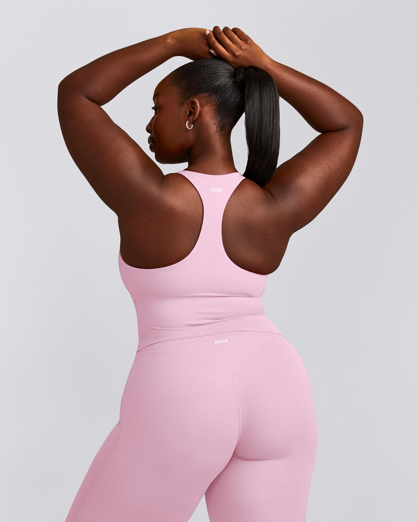 SoftMotion™ Racer Back Mid Vest with Built in Bra Shelf with Grey Logo | Chalk Pink