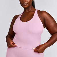 SoftMotion™ Racer Back Mid Vest with Built in Bra Shelf with Grey Logo | Chalk Pink