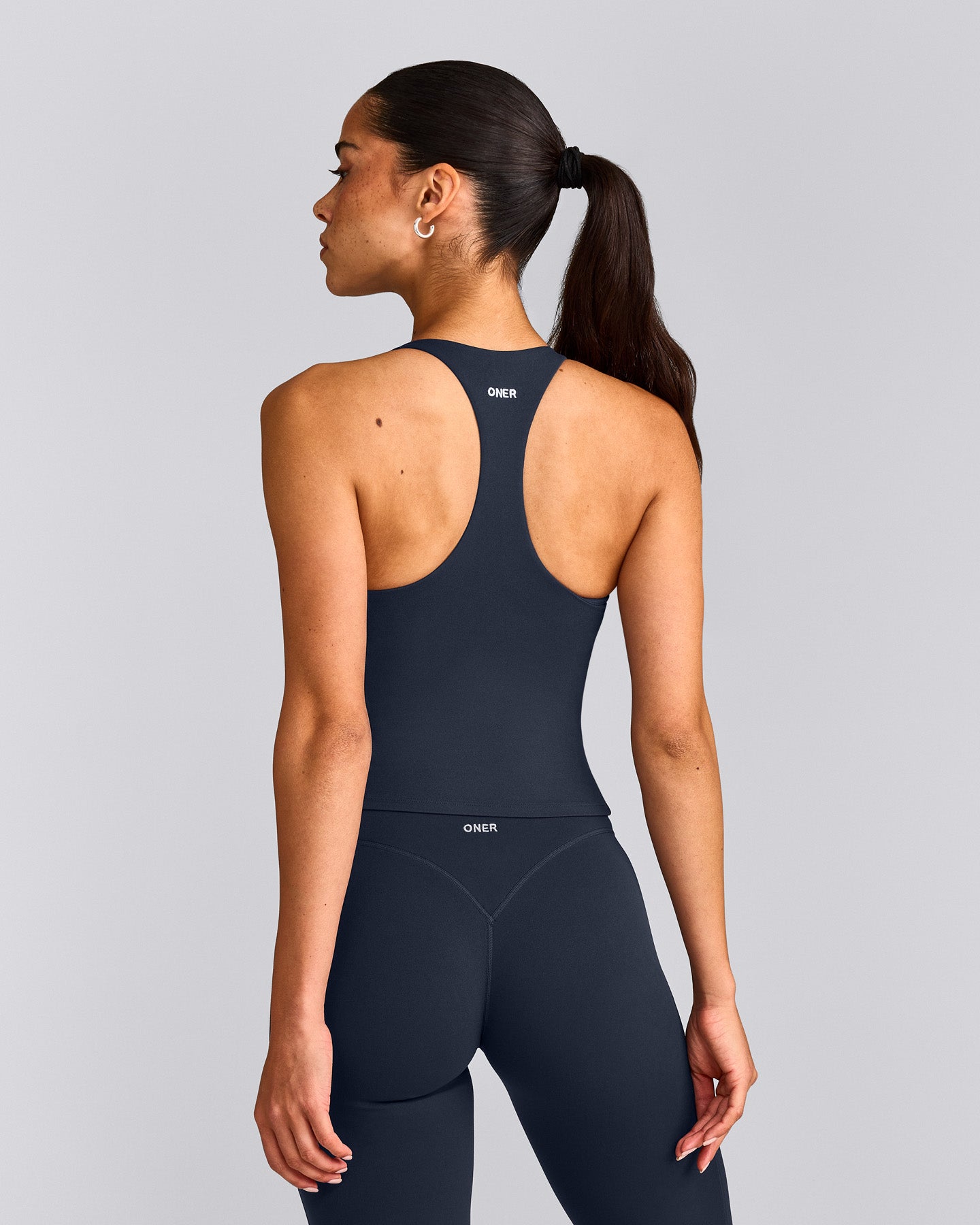 SoftMotion™ Racer Back Mid Vest with Built in Bra Shelf with Grey Logo | True Blue