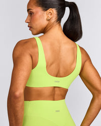 SoftMotion™ Scoop Back Bralette with Grey Logo | Citrus Green