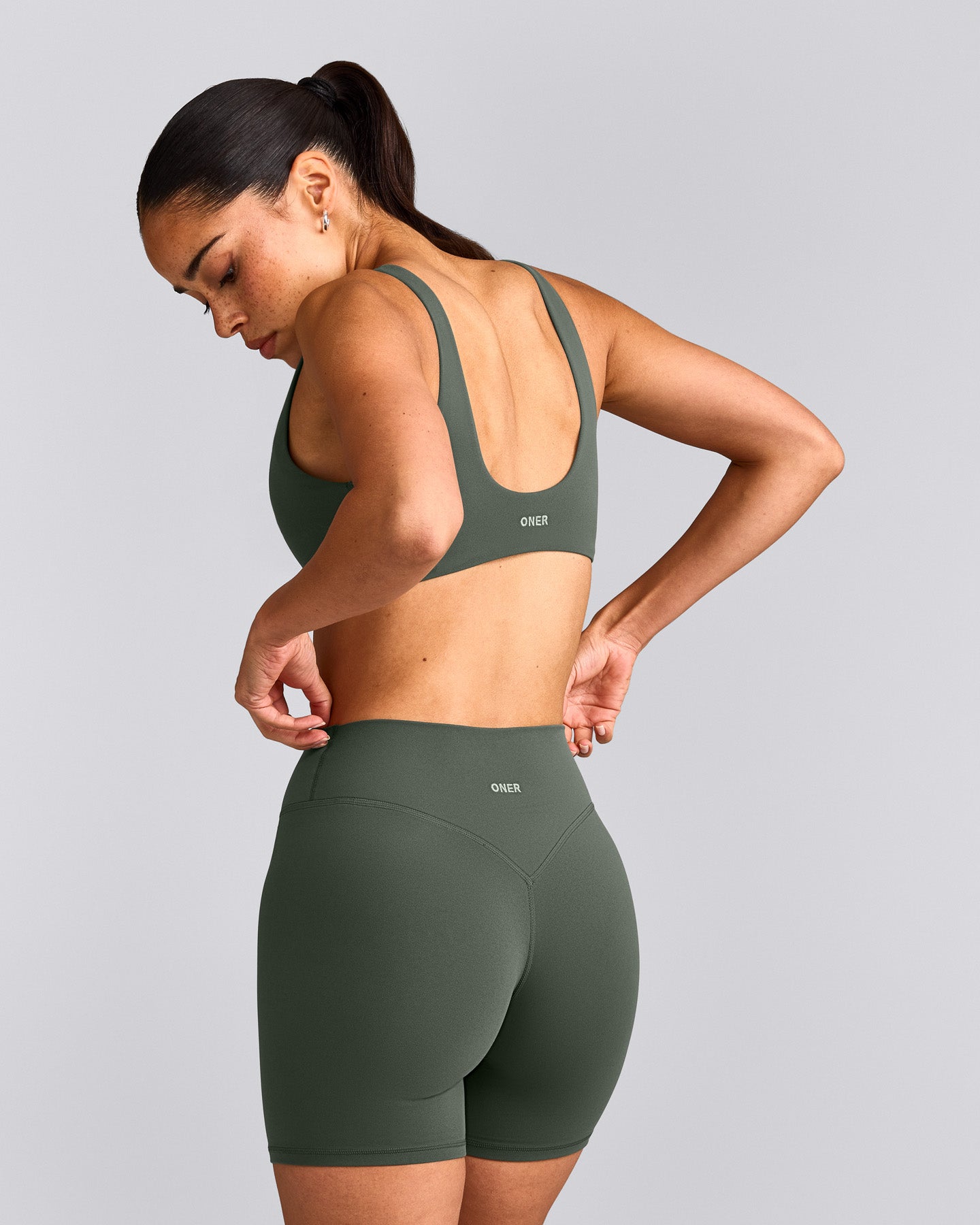 SoftMotion™ Scoop Back Bralette with Grey Logo | Dark Khaki