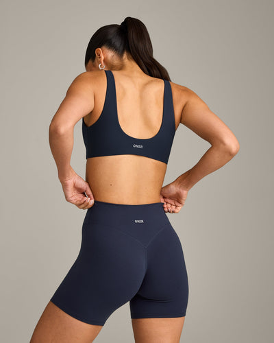 SoftMotion™ Scoop Back Bralette with Grey Logo | True Blue
