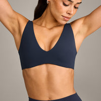 SoftMotion™ Scoop Back Bralette with Grey Logo | True Blue