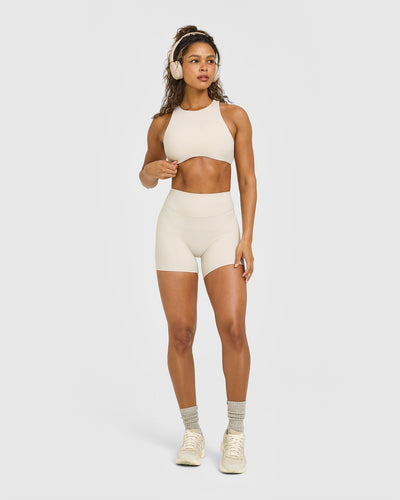 SoftMotion™ High Neck Sports Bra with White Logo | Sand