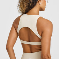 SoftMotion™ High Neck Sports Bra with White Logo | Sand