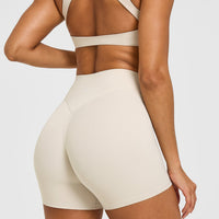 SoftMotion™ High Waisted Shorts 6" with White Logo | Sand