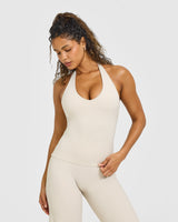 SoftMotion™ Halter Neck Vest with Built in Bra Shelf with White Logo | Sand