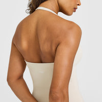 SoftMotion™ Halter Neck Vest with Built in Bra Shelf with White Logo | Sand