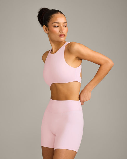 SoftMotion™ High Neck Sports Bra with Grey Logo | Soft Girl Pink