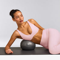 SoftMotion™ Scoop Back Bralette with Grey Logo | Soft Girl Pink
