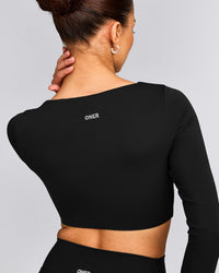 SoftMotion™ Scoop Neck Long Sleeve Crop Top with Built in Bra Shelf with Gray Logo | Black