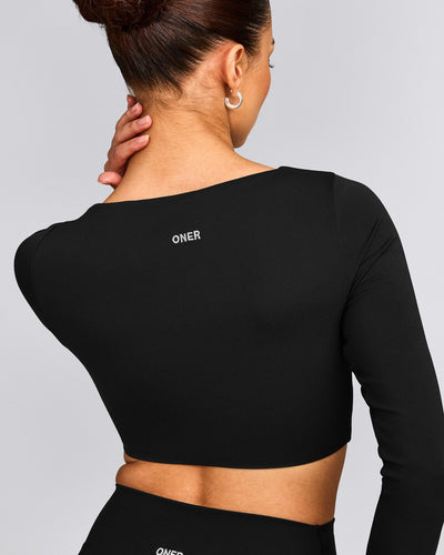 SoftMotion™ Scoop Neck Long Sleeve Crop Top with Built in Bra Shelf with Gray Logo | Black