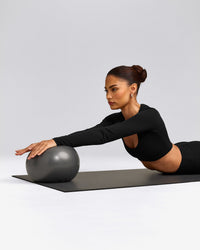 SoftMotion™ Scoop Neck Long Sleeve Crop Top with Built in Bra Shelf with Gray Logo | Black