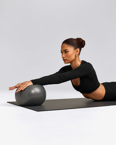 SoftMotion™ Scoop Neck Long Sleeve Crop Top with Built in Bra Shelf with Gray Logo | Black