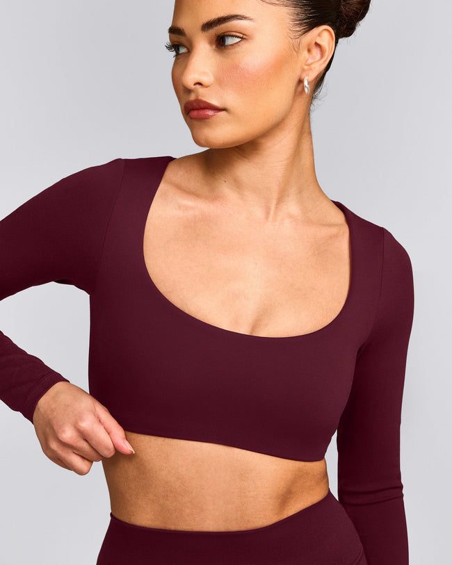 SoftMotion™ Scoop Neck Long Sleeve Crop Top with Built in Bra Shelf with Grey Logo | Cherry Lacquer Purple