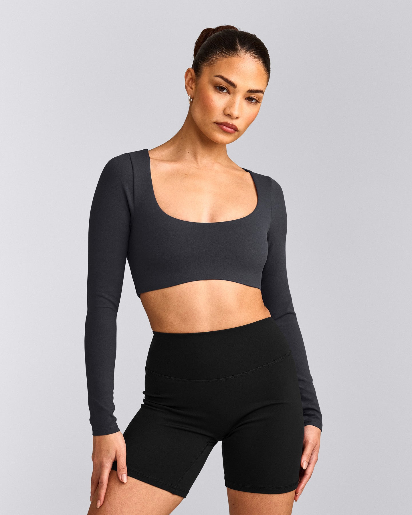 SoftMotion™ Scoop Neck Long Sleeve Crop Top with Built in Bra Shelf with Grey Logo | Coal