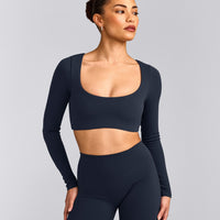 SoftMotion™ Scoop Neck Long Sleeve Crop Top with Built in Bra Shelf with Grey Logo | True Blue