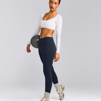 SoftMotion™ Scoop Neck Long Sleeve Crop Top with Built in Bra Shelf with Grey Logo | White